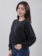 เสื้อสเวตเชิ้ตผู้หญิง คอลเลคชั่น DENIM OBSESSION CROPPED FIT สีดำ