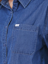 เสื้อเชิ้ตแขนสั้นผู้หญิง OVERSIZE FIT สียีนส์กลาง