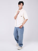 เสื้อเชิ้ตแขนสั้นผู้ชาย COMFORT FIT สีครีม