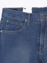 กางเกงยีนส์ผู้ชาย RAMONE FIT เอวต่ำ ทรงเข้ารูป สียีนส์กลาง