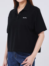 เสื้อโปโลแขนสั้นผู้หญิง OVERSIZE FIT สีดำ