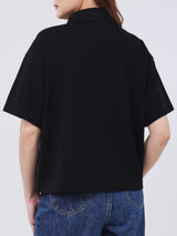 เสื้อโปโลแขนสั้นผู้หญิง OVERSIZE FIT สีดำ