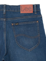 กางเกงยีนส์ผู้ชาย RAMONE FIT เอวต่ำ ทรงเข้ารูป สียีนส์กลาง